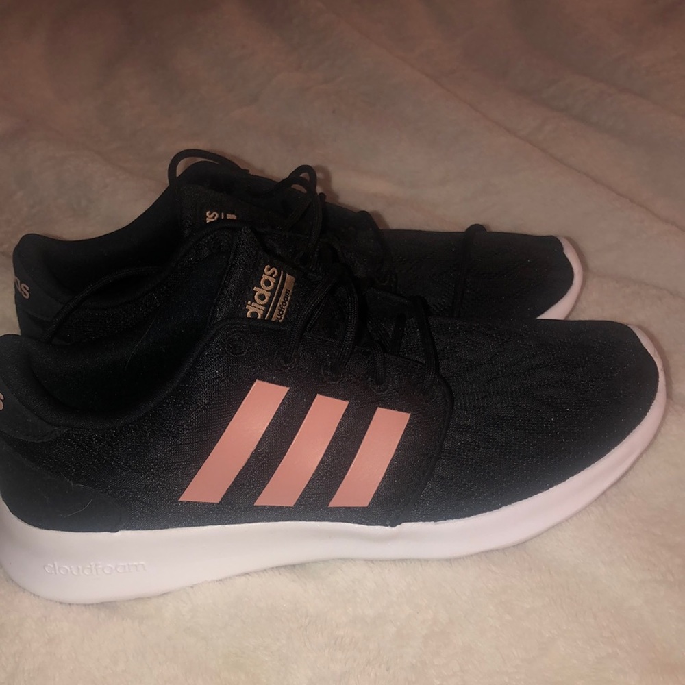 Never worn black with pink stripes Adidas shoes